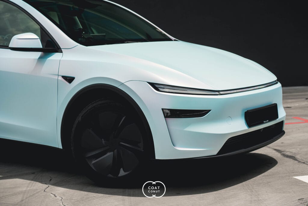 Tesla Model Y Juniper with a white colour-change wrap